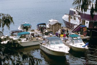 The Kyuquot Ship anchored with fleet docked along side